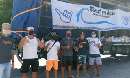 Surfistas arrecadam alimentos para doar a comunidades da Baixada
